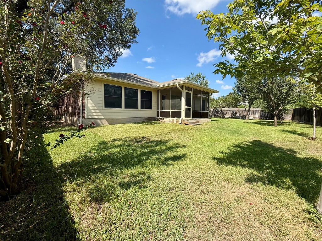 4526 Tello Path Austin, TX 78749 - Photo 21 of 24 a front view of a house with a yard