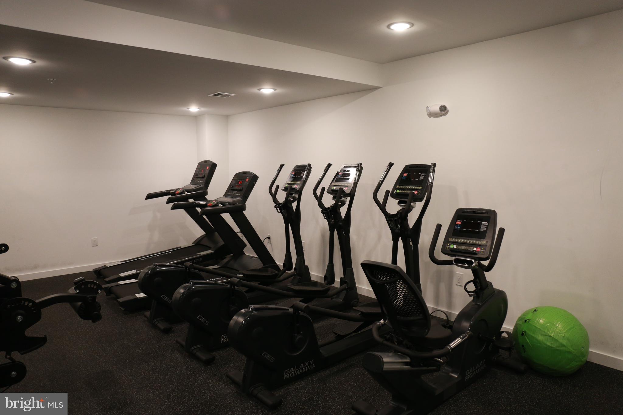 1111 South Broad Street, Unit 2BED/2BATH Philadelphia, PA 19147 - Photo 11 of 25 a view of a room with gym equipment