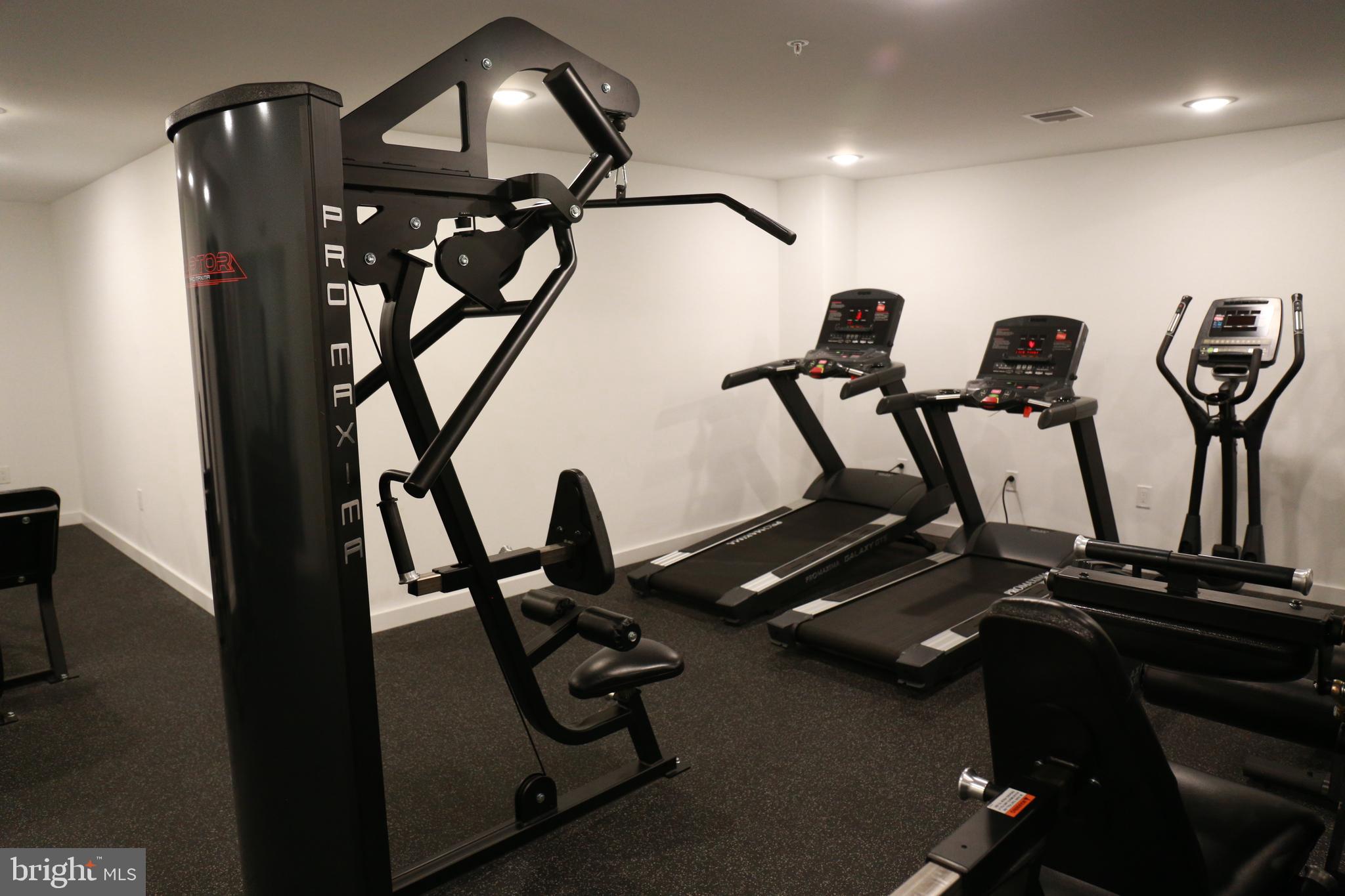 1111 South Broad Street, Unit 2BED/2BATH Philadelphia, PA 19147 - Photo 12 of 25 a view of a room with gym equipment