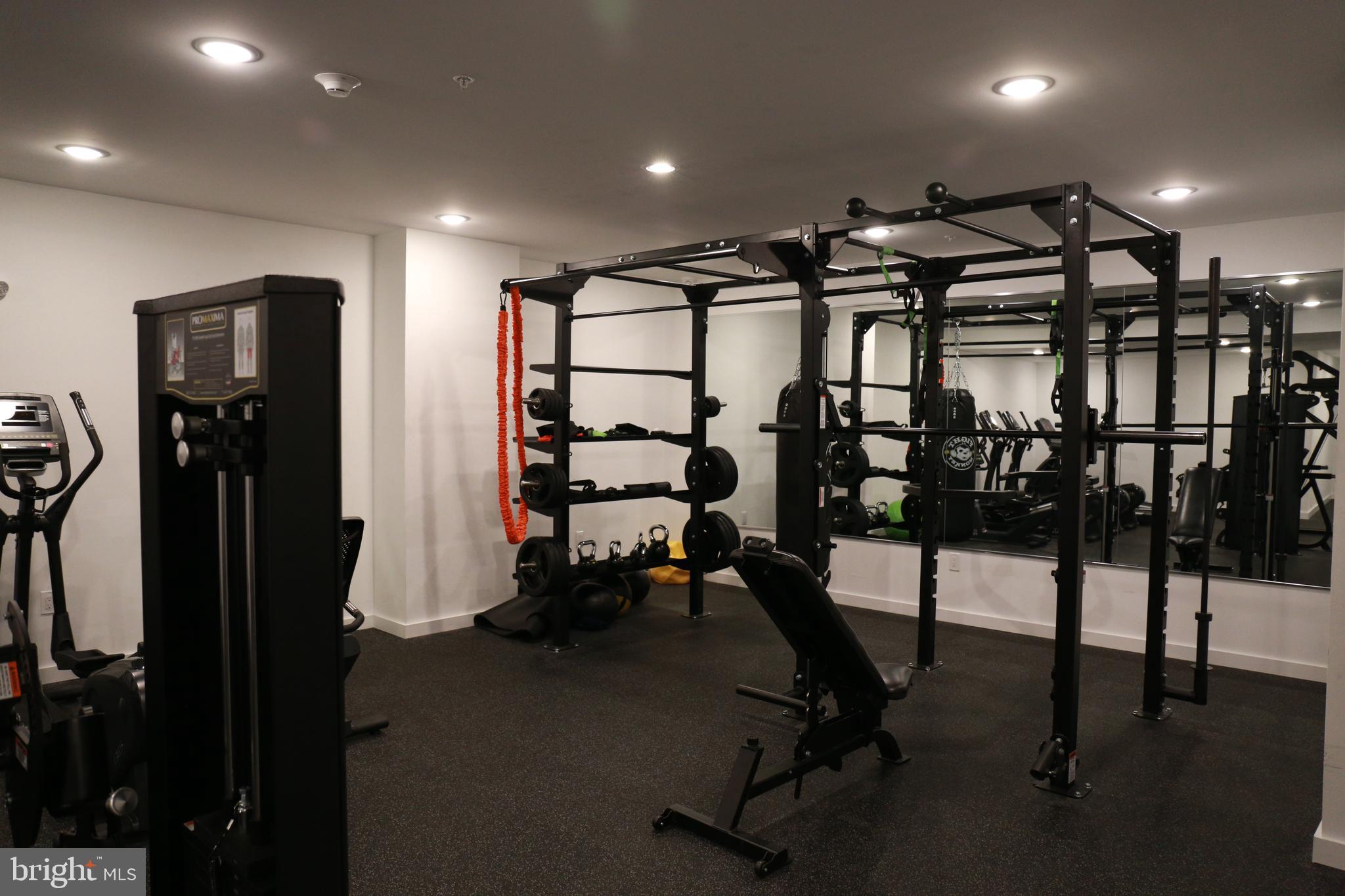1111 South Broad Street, Unit 2BED/2BATH Philadelphia, PA 19147 - Photo 9 of 25 a view of a room with gym equipment