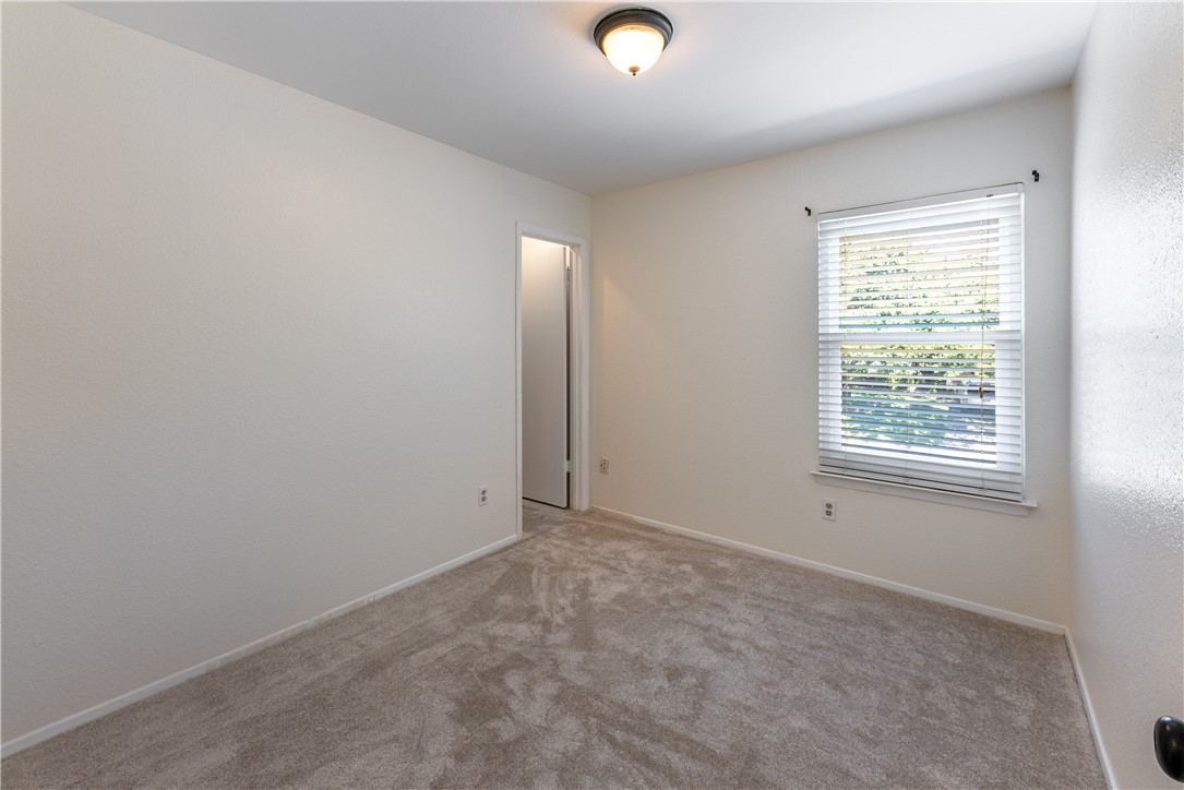 12702 Rhea Court Austin, TX 78727 - Photo 17 of 19 Bedroom 3 with walk in closet