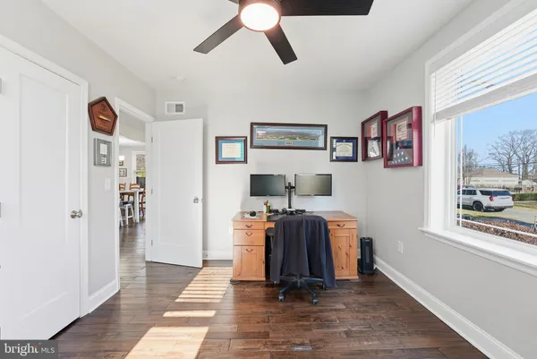 a view of room with workspace and window