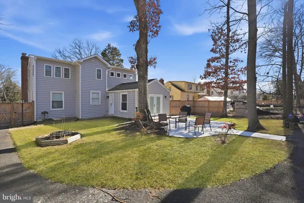 a view of swimming pool with outdoor seating