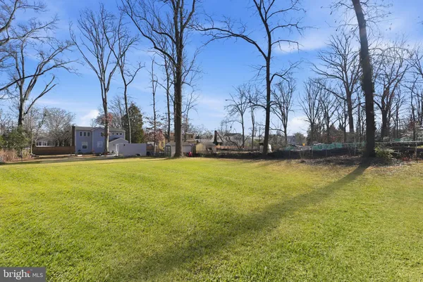 a view of yard with swimming pool