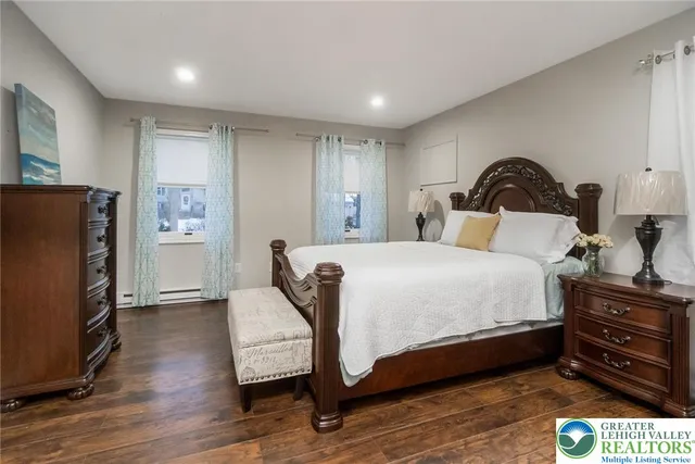 a bathroom with a sink double vanity and shower