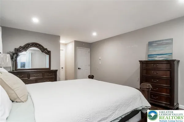 a bathroom with a sink double vanity and shower