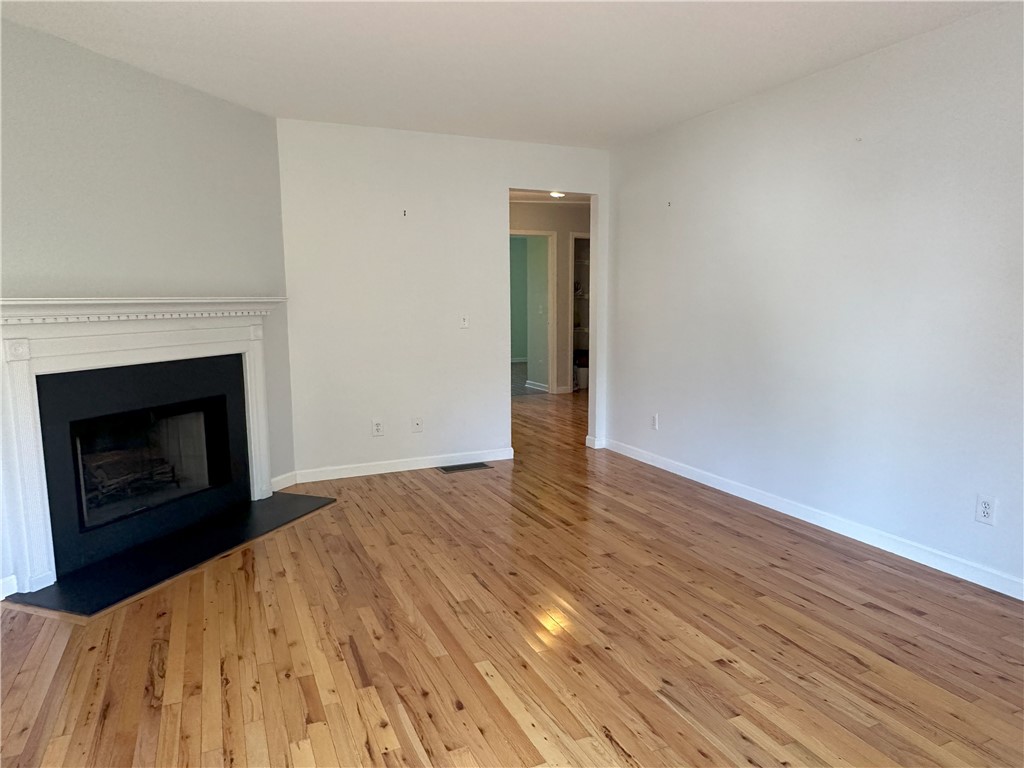 153 High Street, Unit 24 Westerly, RI 02891 - Photo 3 of 21 Fireplace, hardwood floors