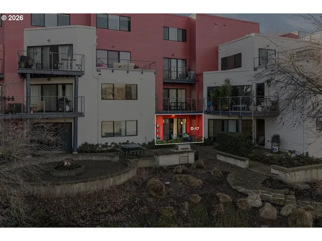 a view of multiple houses with a street