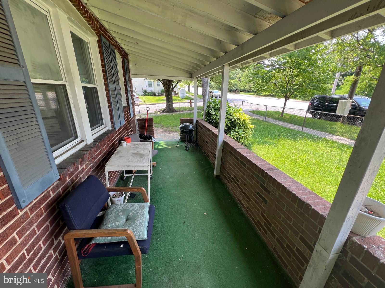 313 Cherry Hill Road Baltimore, MD 21225 - Photo 5 of 16 a view of swimming pool with a chairs in patio