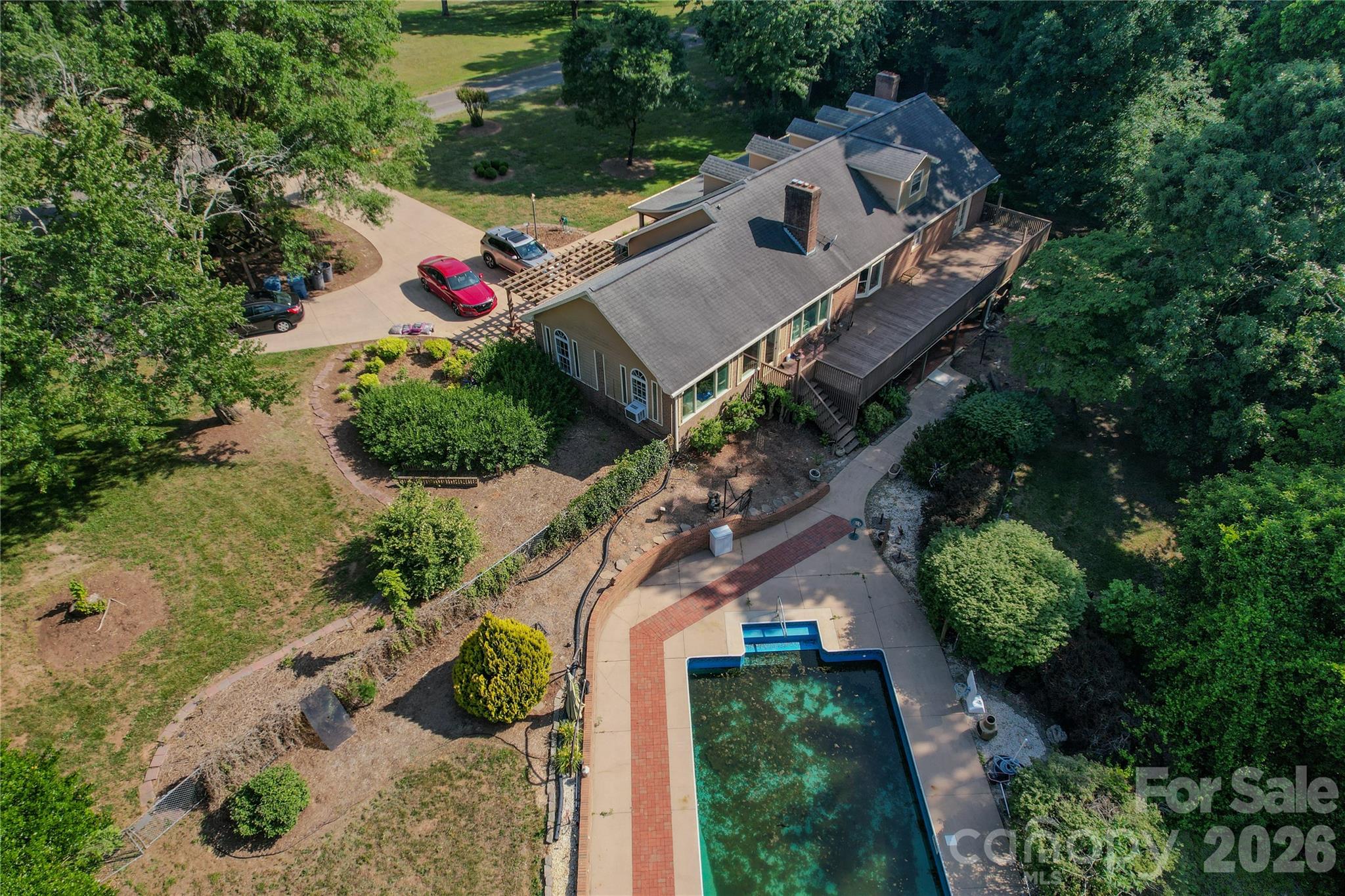 204 Old Stage Coach Road Lawndale, NC 28090 - Photo 4 of 30 an aerial view of house with yard and swimming pool