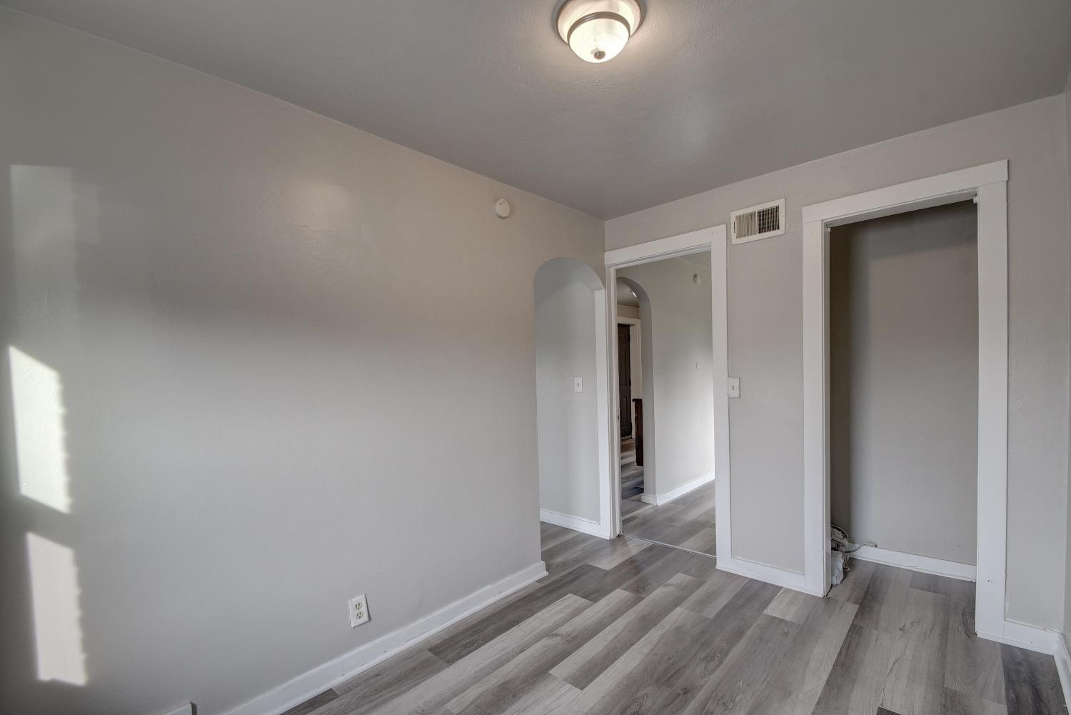 3044 West Ridge Road, Unit RD Gary, IN 46408 - Photo 10 of 13 a view of hallway with wooden floor