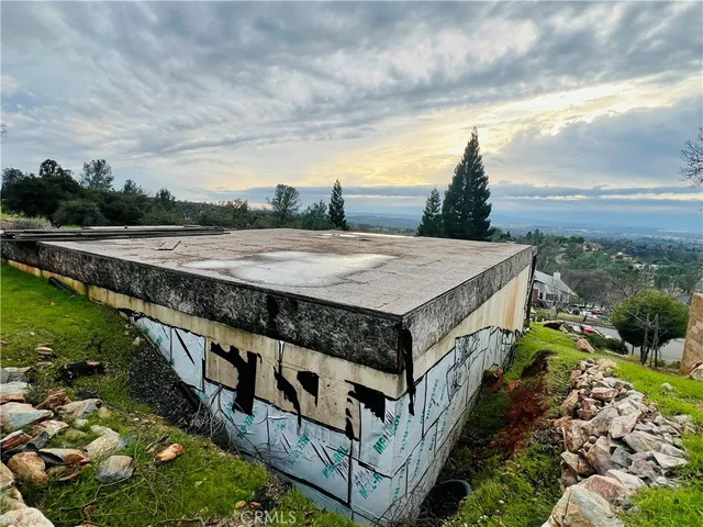 a view of a terrace with a garden