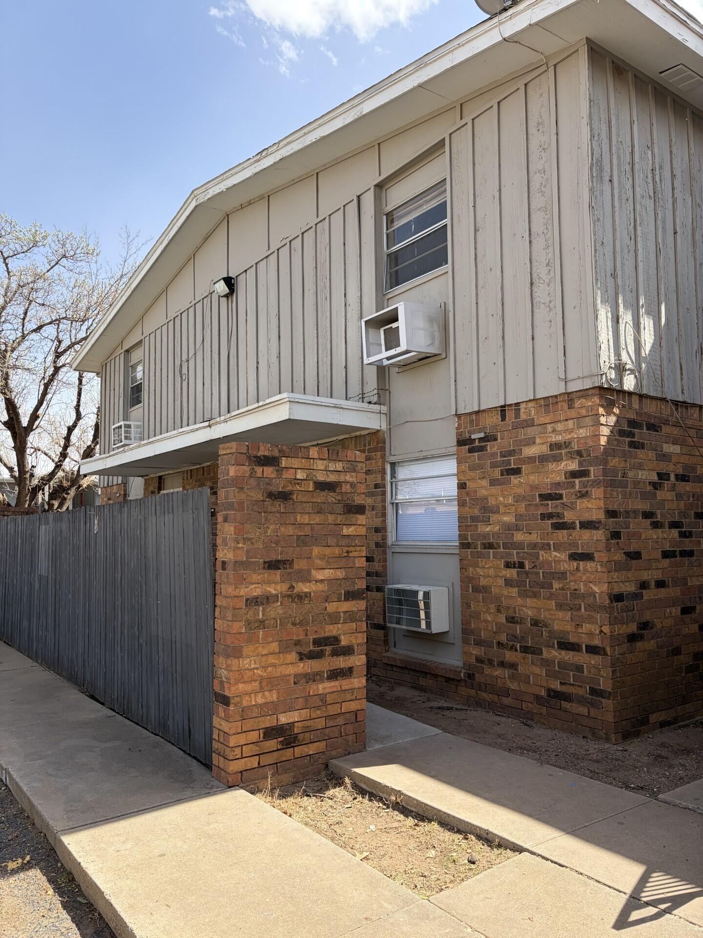 3201 35th Street, Unit 3 Lubbock, TX 79413 - Photo 1 of 1 a view of outdoor space garage