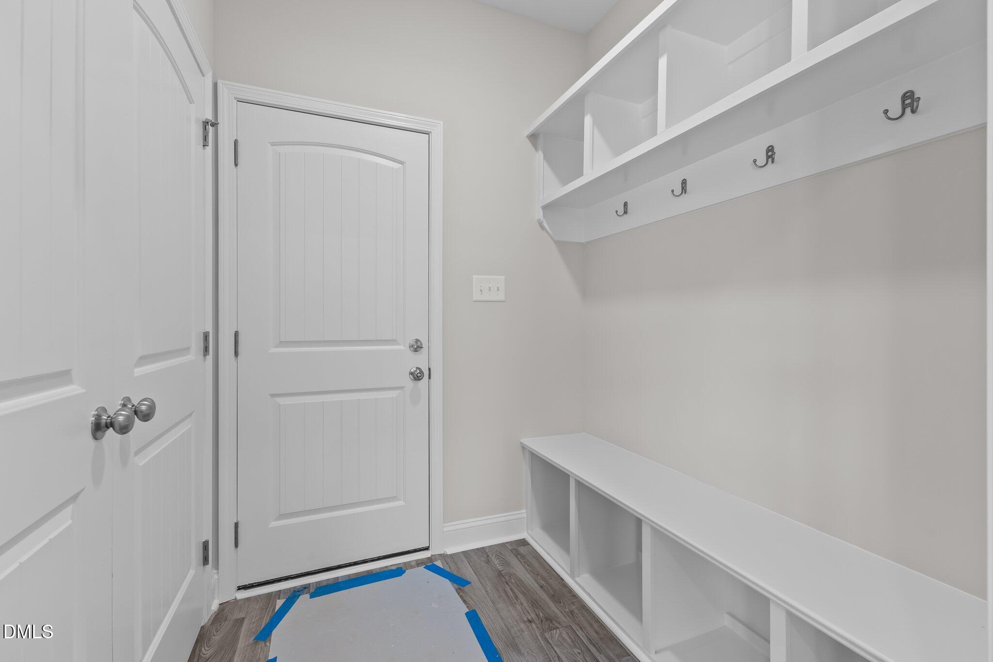 506 Bill Avery Road Coats, NC 27521 - Photo 11 of 21 a view of an empty walk in closet