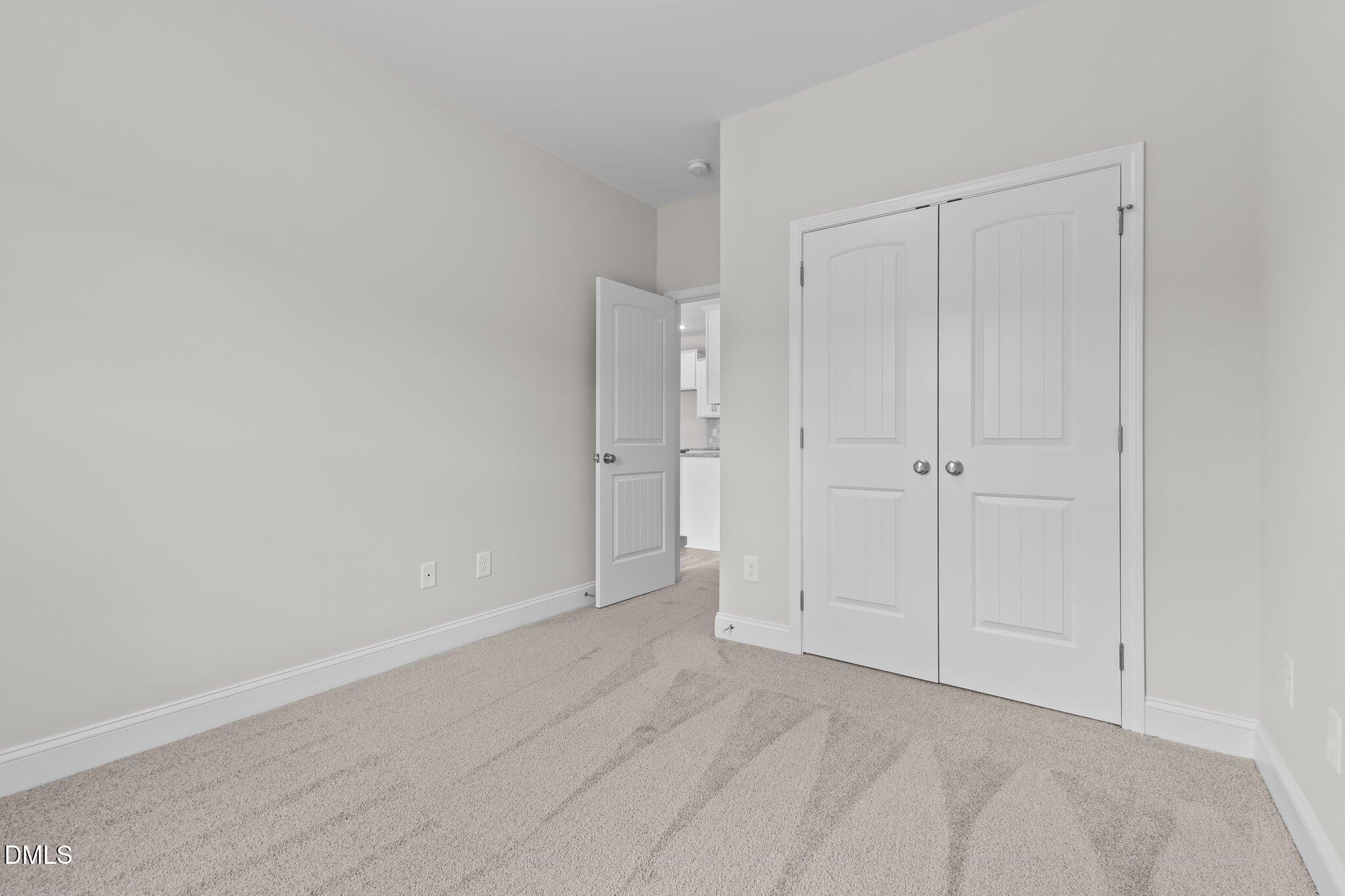 506 Bill Avery Road Coats, NC 27521 - Photo 14 of 21 a view of an empty room