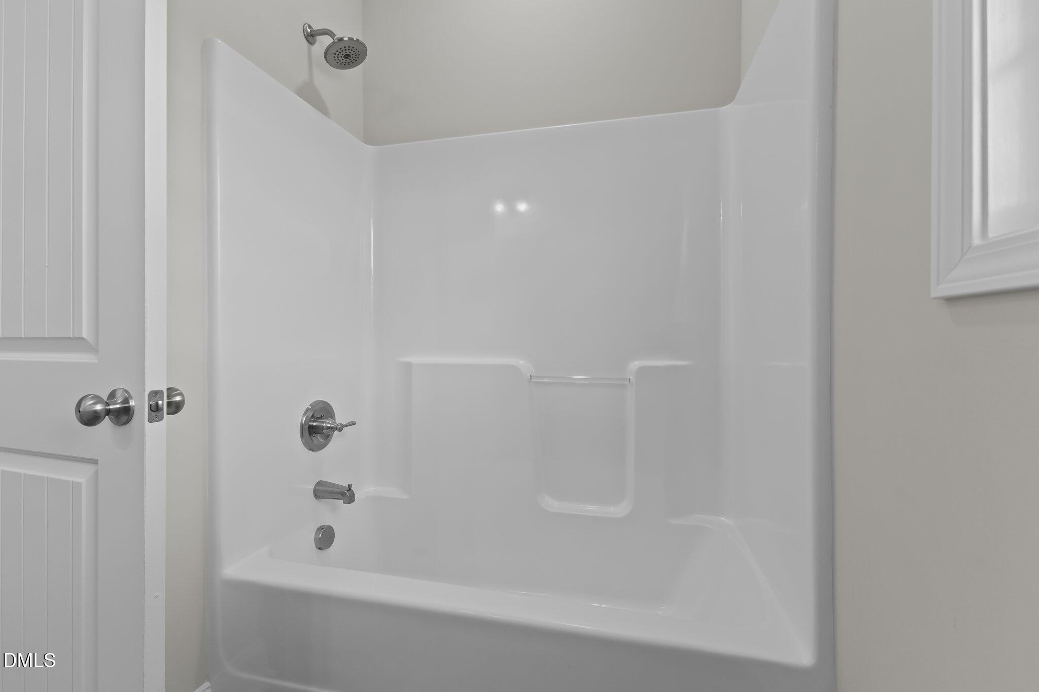 506 Bill Avery Road Coats, NC 27521 - Photo 16 of 21 a bathroom with a shower