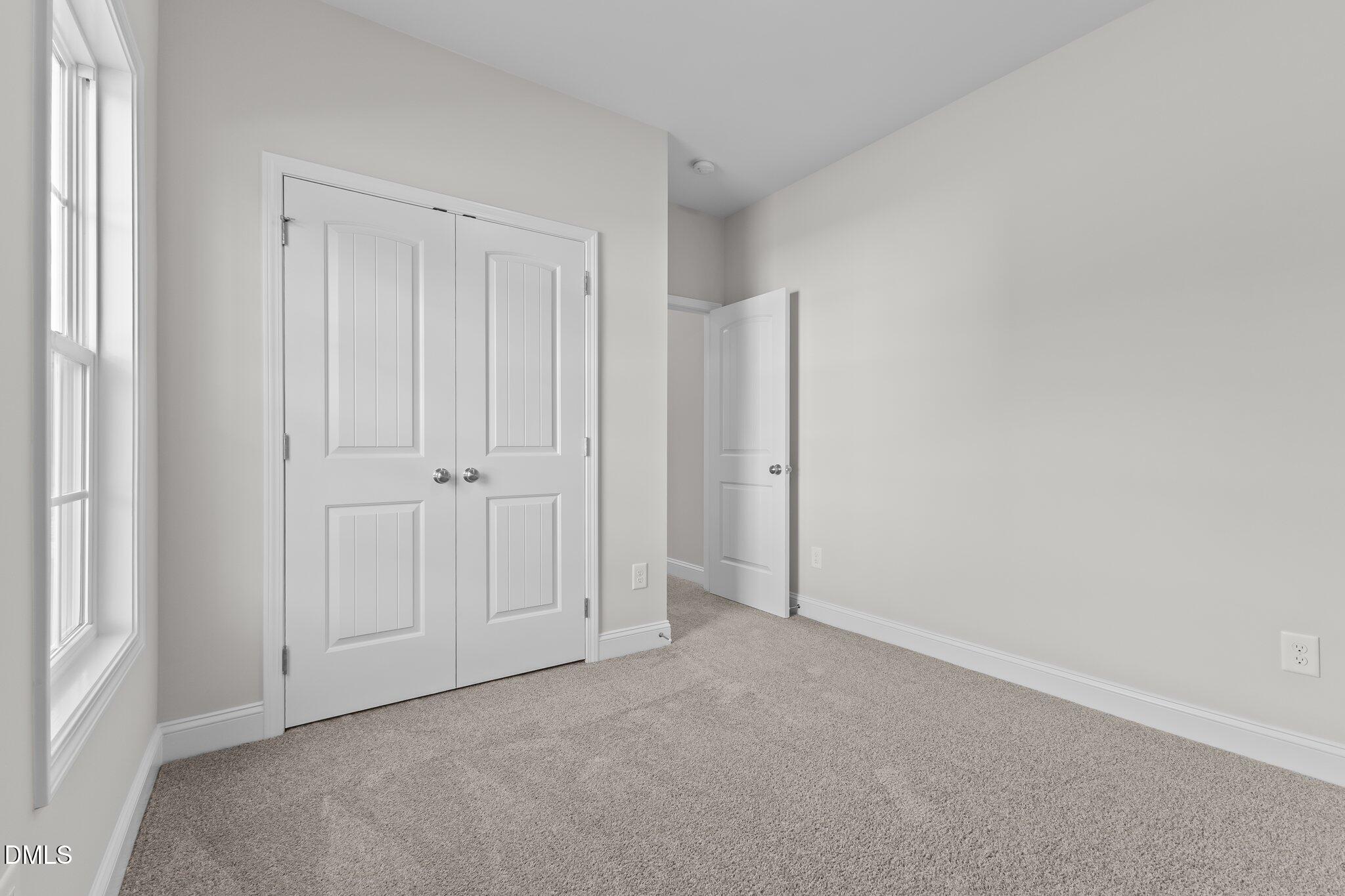 506 Bill Avery Road Coats, NC 27521 - Photo 17 of 21 a view of an empty room
