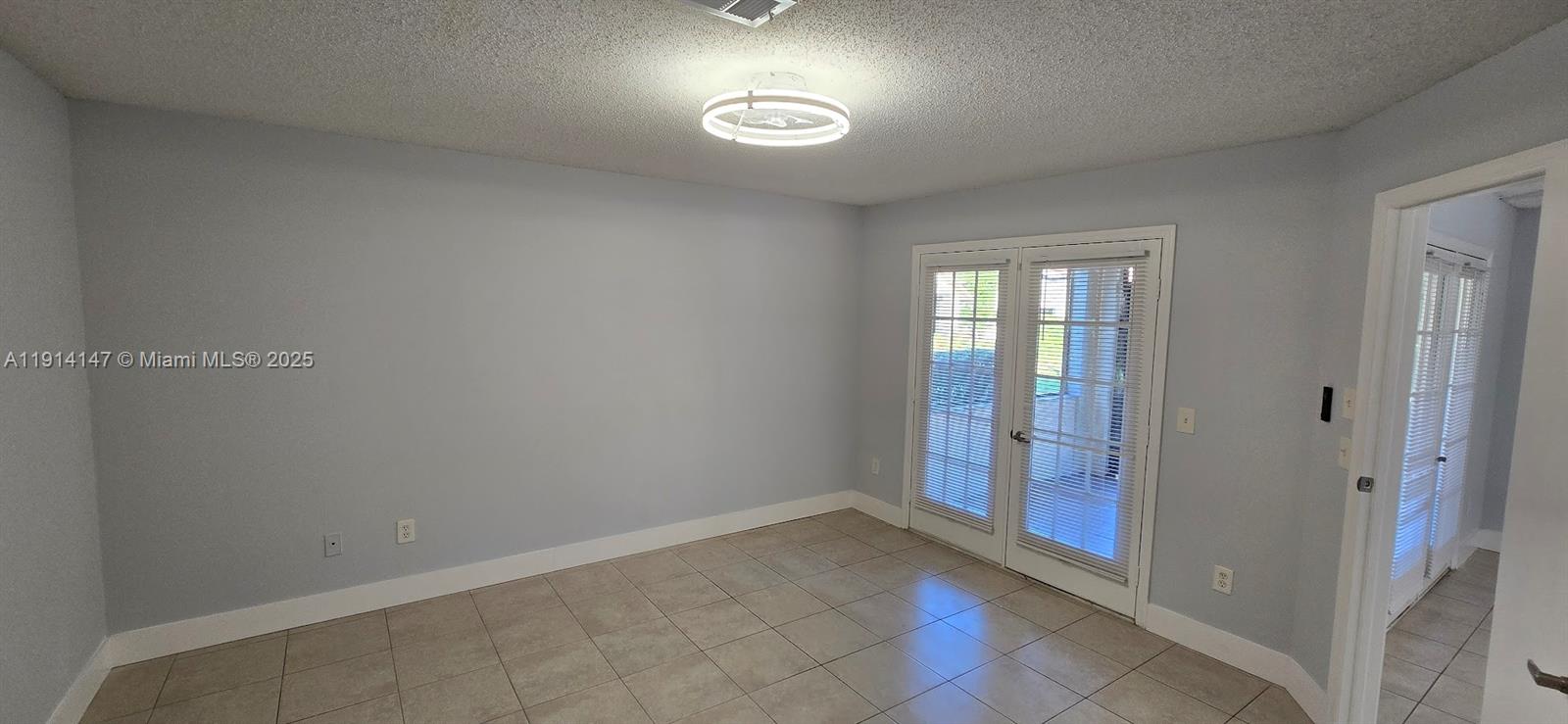 Lakes at Boca Raton Boca Raton, FL 33498 - Photo 11 of 18 an empty room with windows and closet
