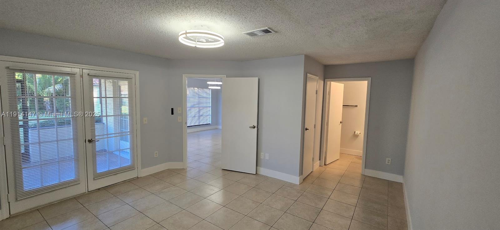 Lakes at Boca Raton Boca Raton, FL 33498 - Photo 12 of 18 a view of an empty room with bathroom and a shower