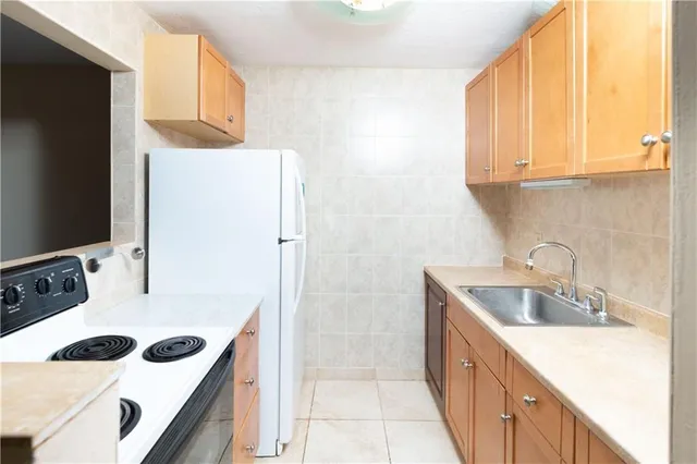 a bathroom with a double vanity sink and mirror