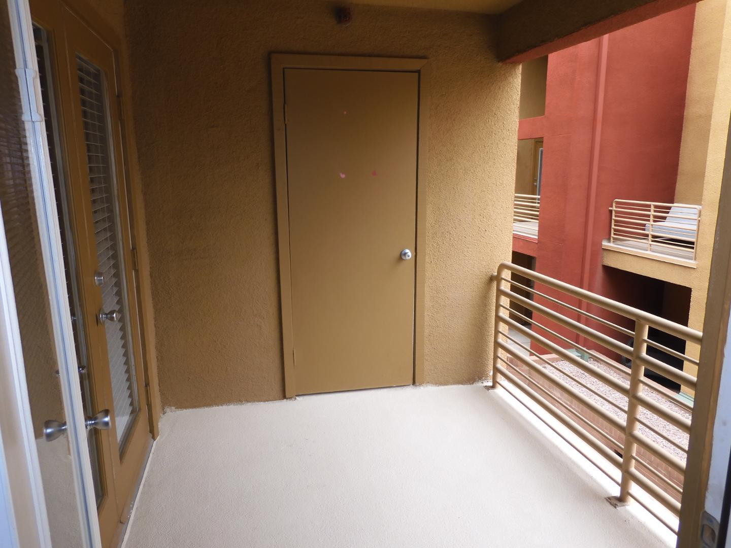 154 West 5th Street, Unit 233 Tempe, AZ 85281 - Photo 12 of 29 a bedroom with a bed and a shower
