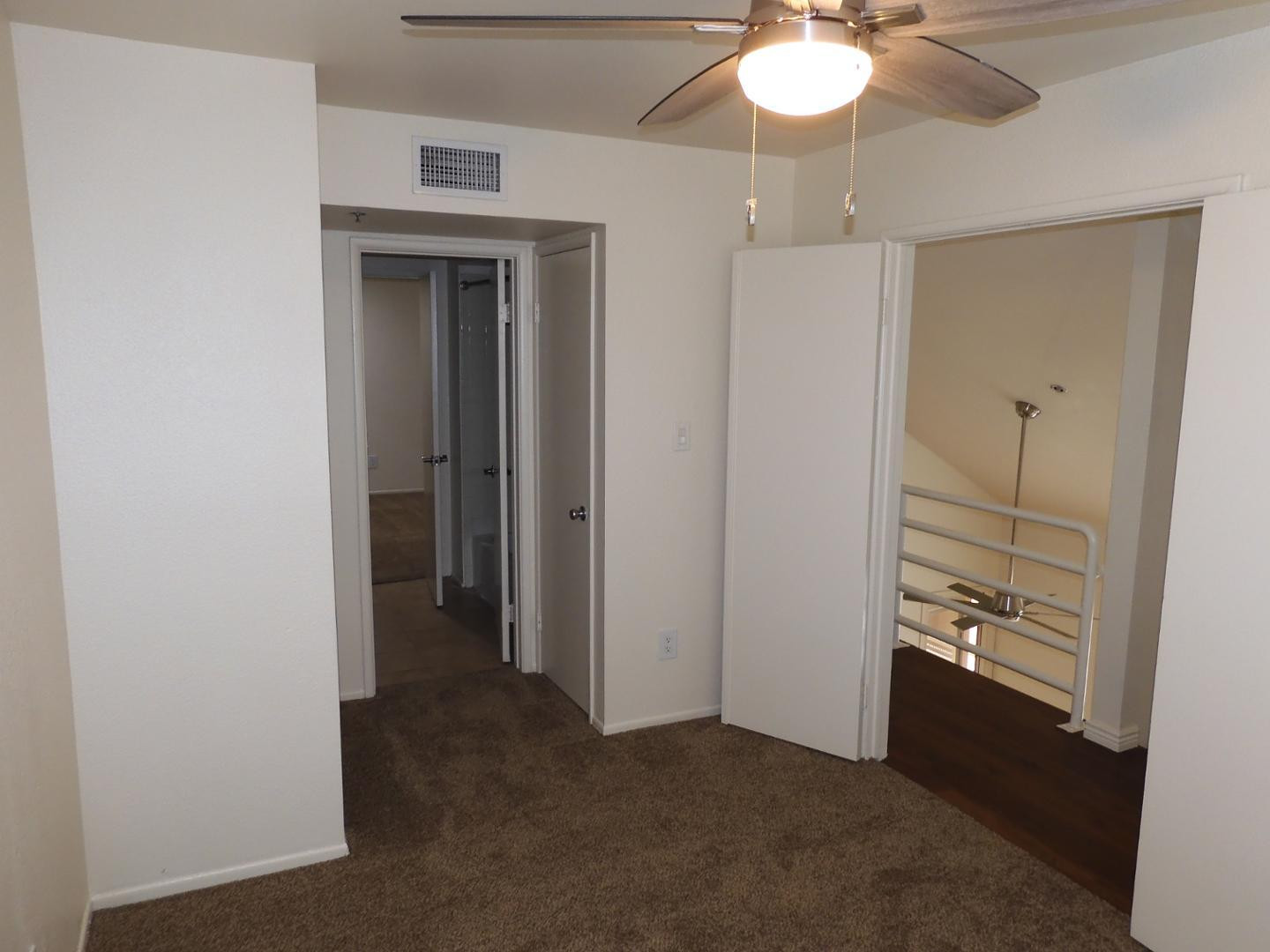 154 West 5th Street, Unit 233 Tempe, AZ 85281 - Photo 16 of 29 wooden floor in an empty room with a bathroom