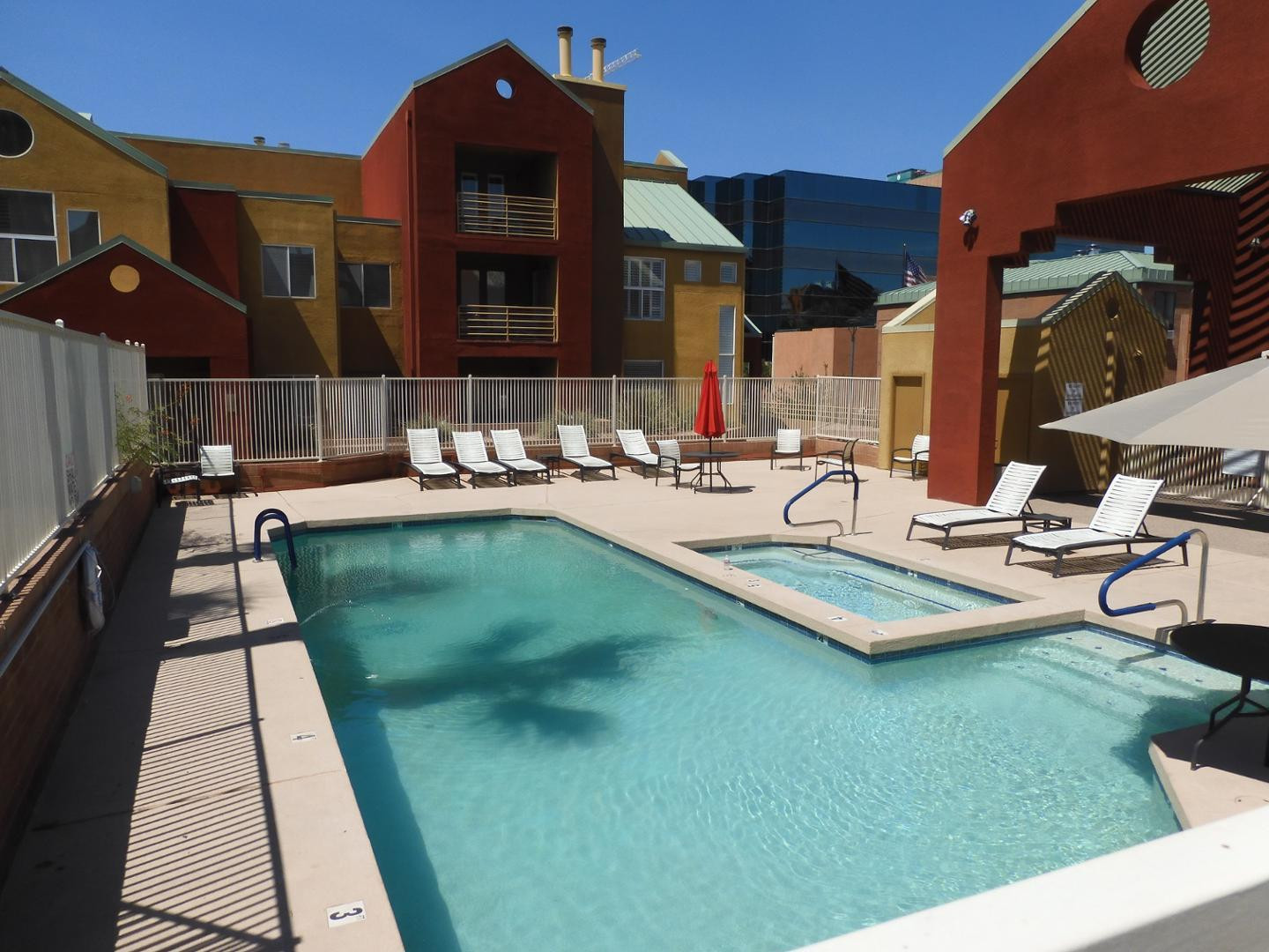 154 West 5th Street, Unit 233 Tempe, AZ 85281 - Photo 27 of 29 a backyard of a house with table and chairs