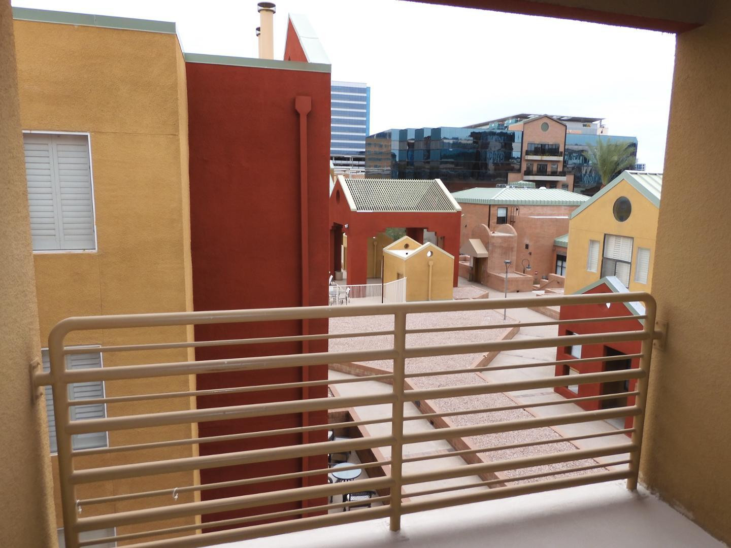 154 West 5th Street, Unit 233 Tempe, AZ 85281 - Photo 6 of 29 a view of a balcony with two chairs