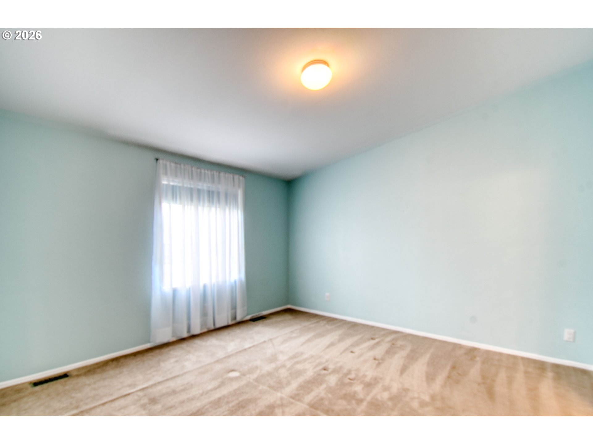 303 East College Street Athena, OR 97813 - Photo 20 of 42 a view of an empty room and window