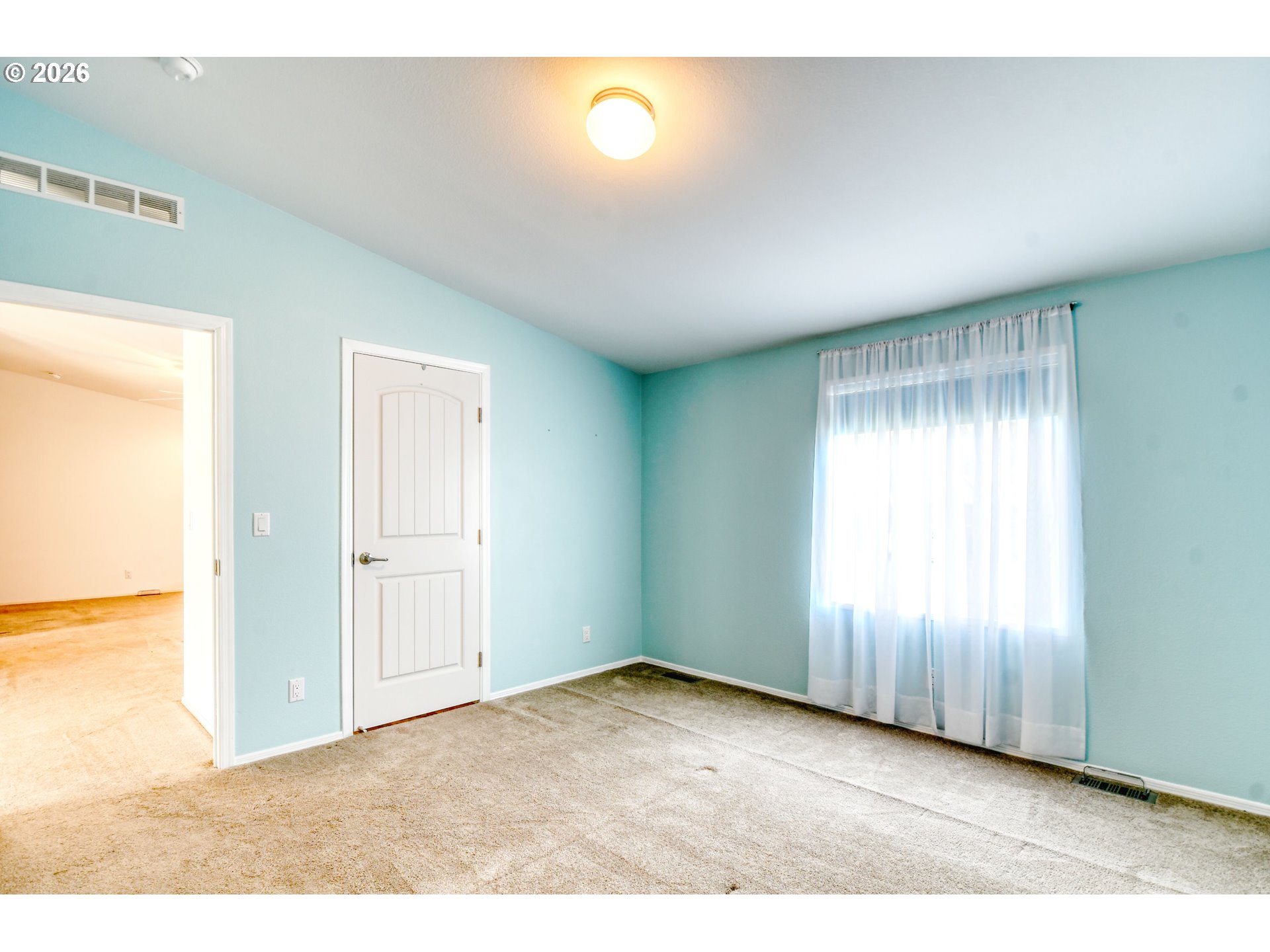 303 East College Street Athena, OR 97813 - Photo 21 of 42 a view of an empty room and window