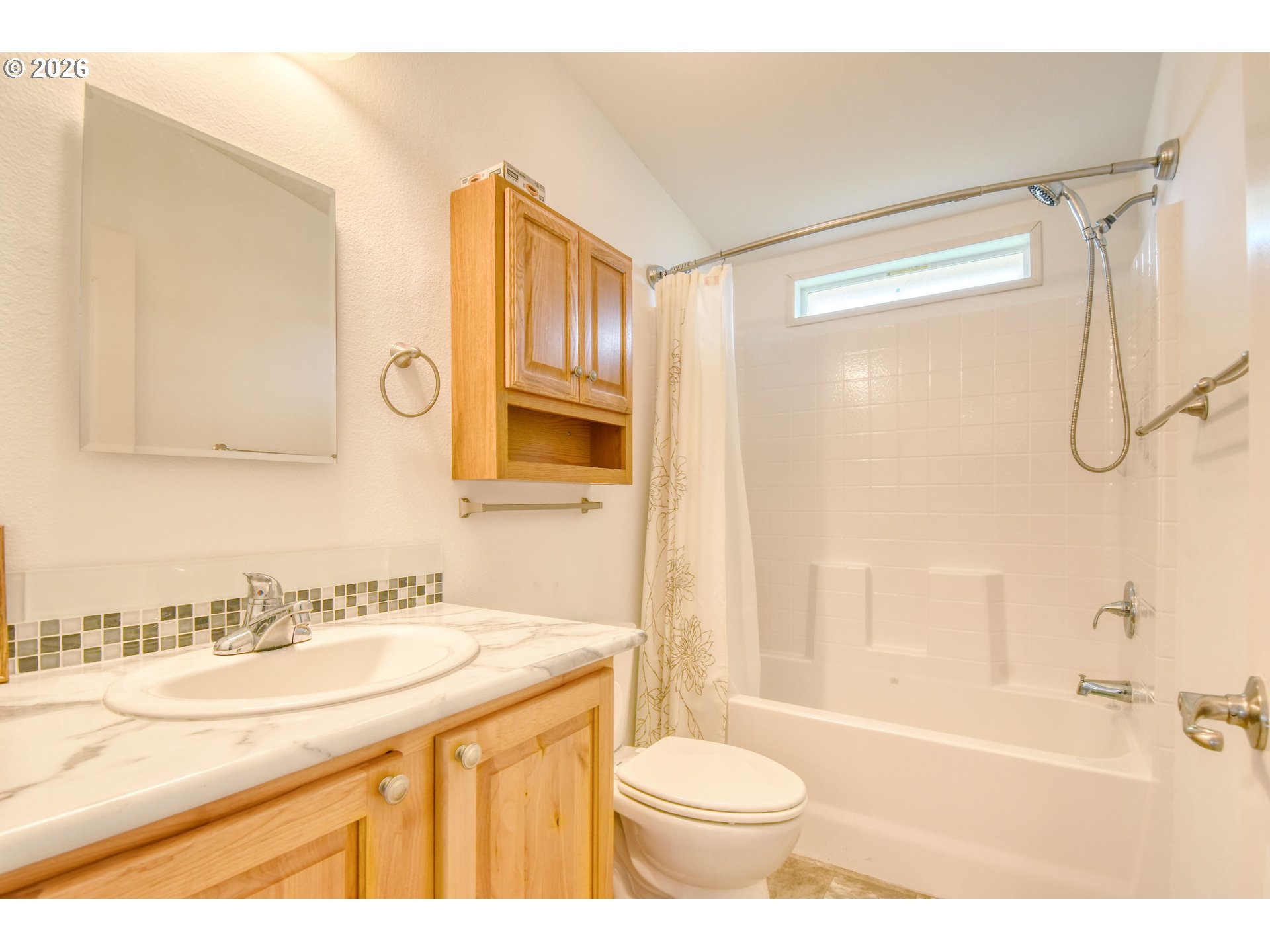 303 East College Street Athena, OR 97813 - Photo 28 of 42 a bathroom with a sink a toilet and a bathtub