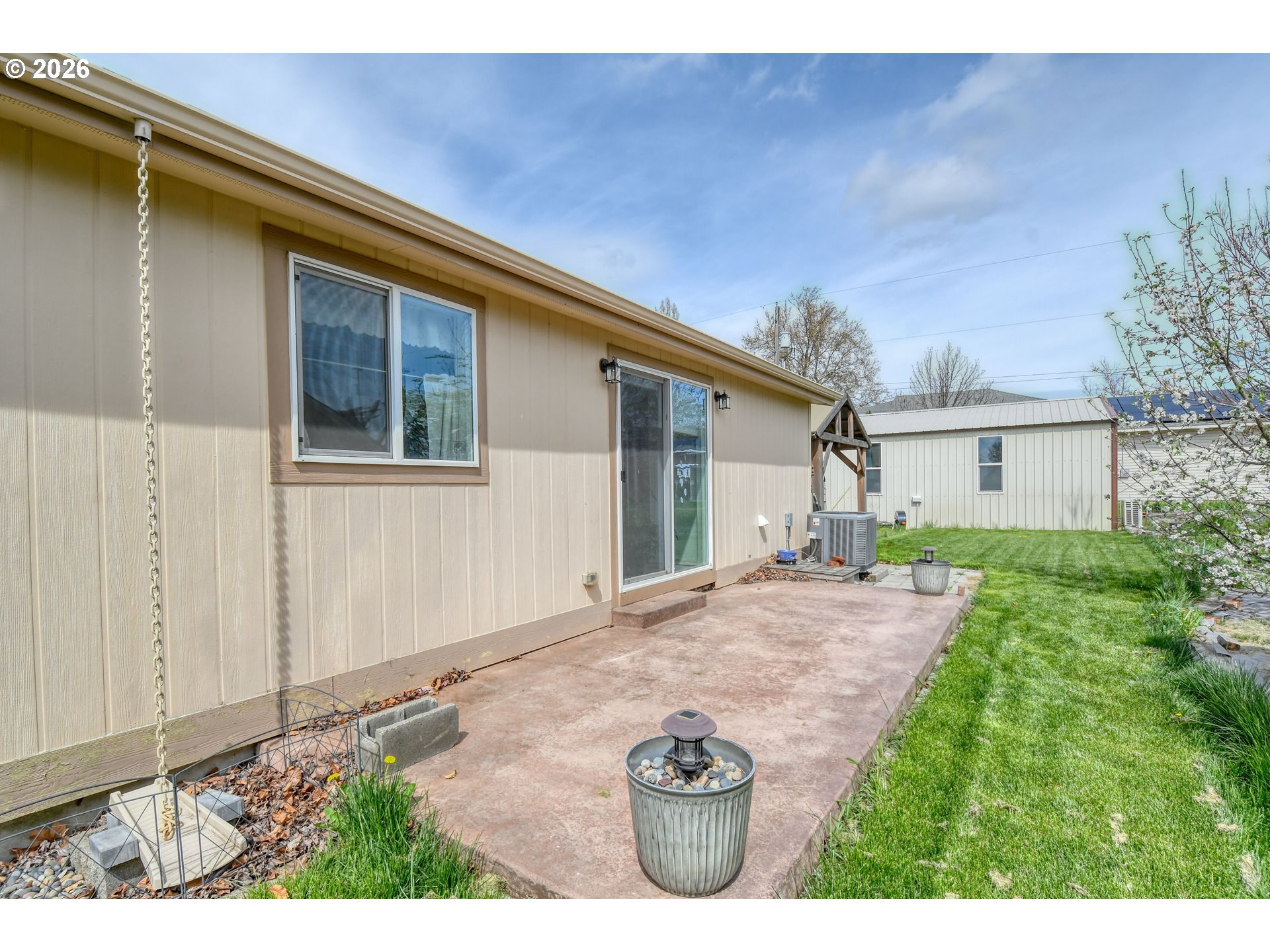303 East College Street Athena, OR 97813 - Photo 36 of 42 a view of a house with backyard and garden