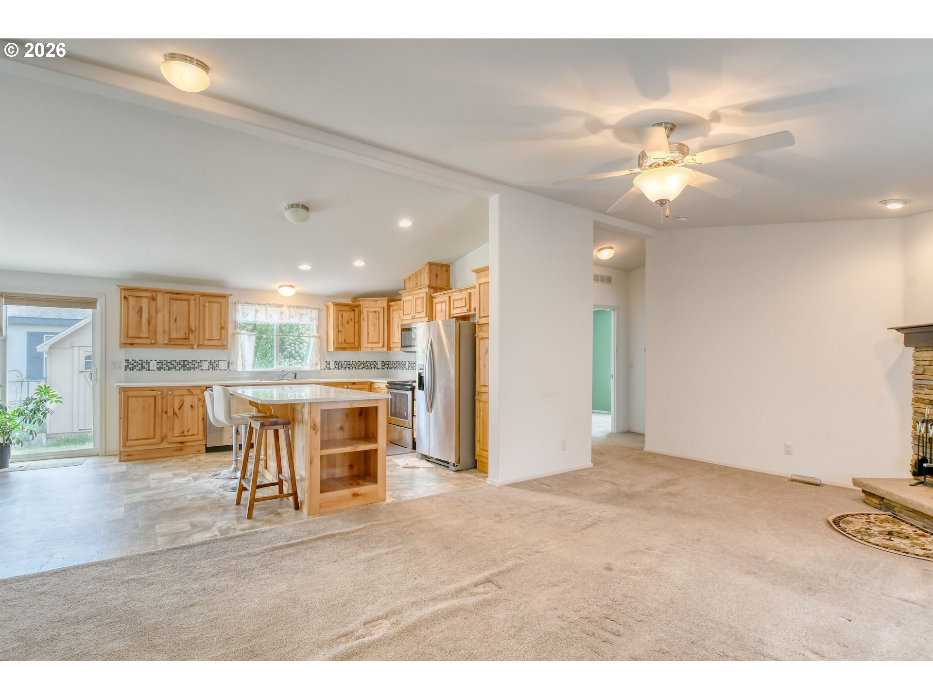 303 East College Street Athena, OR 97813 - Photo 7 of 42 a view of kitchen with cabinets and wooden floor