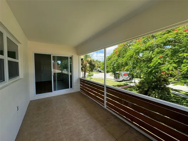 a view of a balcony with an outdoor space