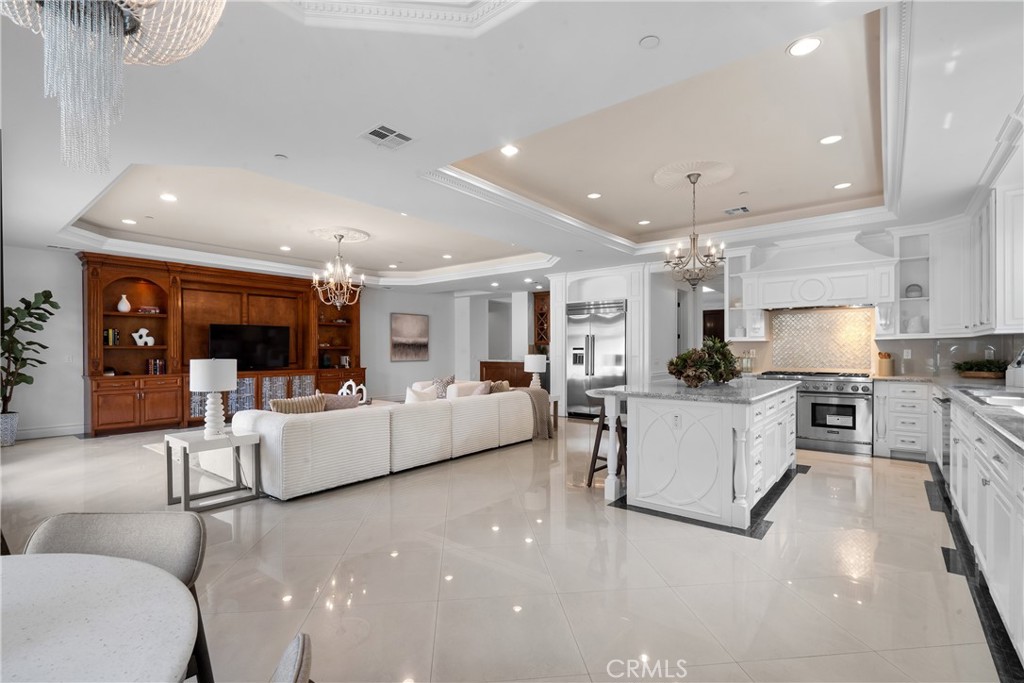 3255 Lombardy Road Pasadena, CA 91107 - Photo 13 of 69 family room leads to massive kitchen