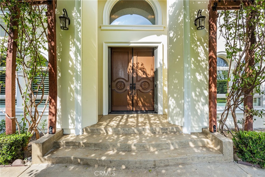 3255 Lombardy Road Pasadena, CA 91107 - Photo 64 of 69 front door with gorgeous flowering vines providing shade