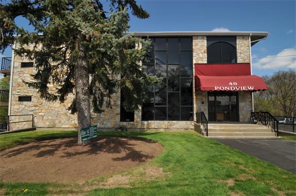 40 Cochituate Road, Unit 39 Framingham, MA 01701 - Photo 1 of 16 a front view of a house with a yard
