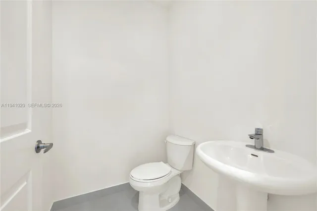 a view of room with racks on the wall