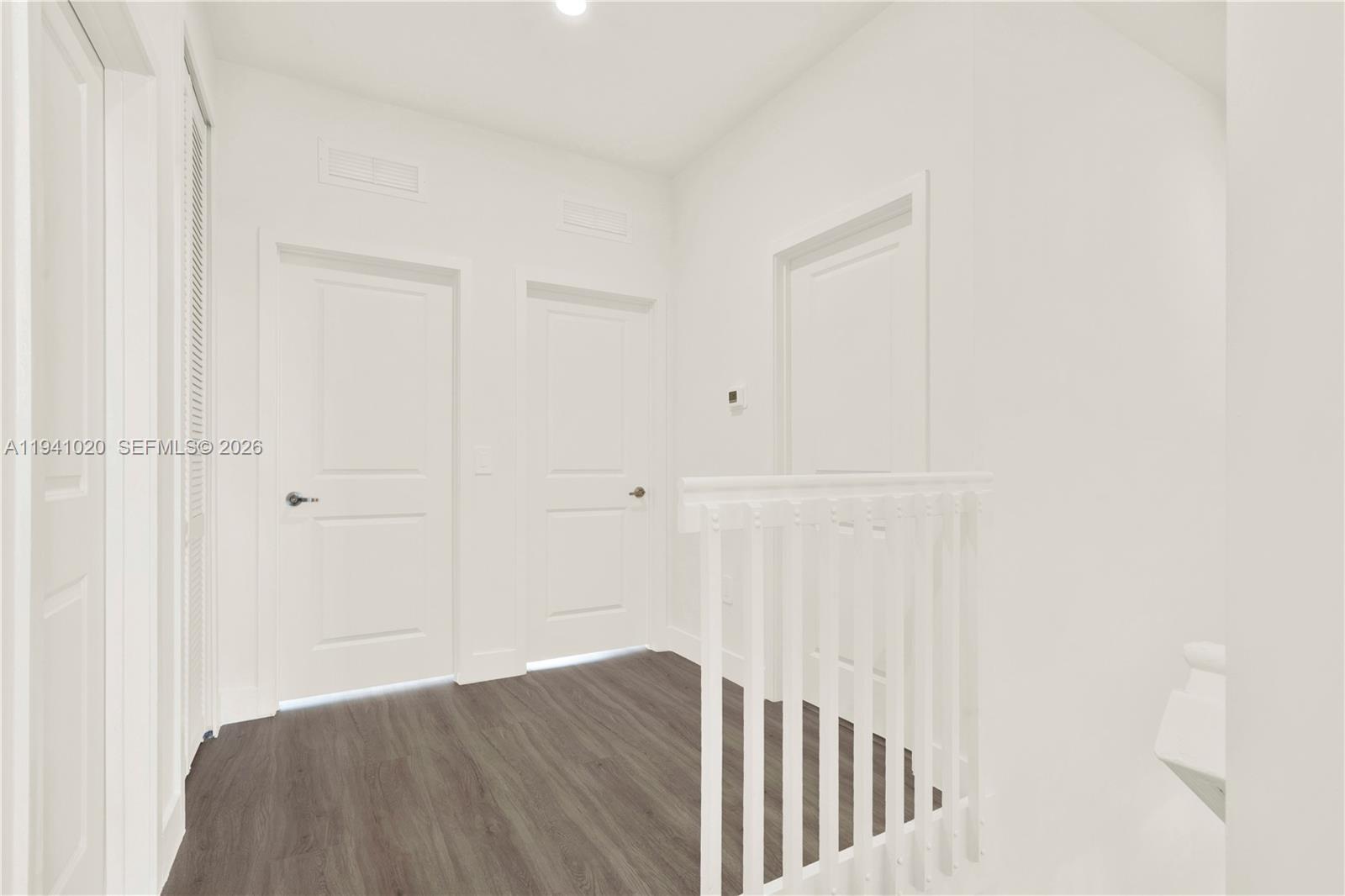 18981 Southwest 344th Terrace, Unit 18981 Homestead, FL 33034 - Photo 20 of 34 a view of a hallway