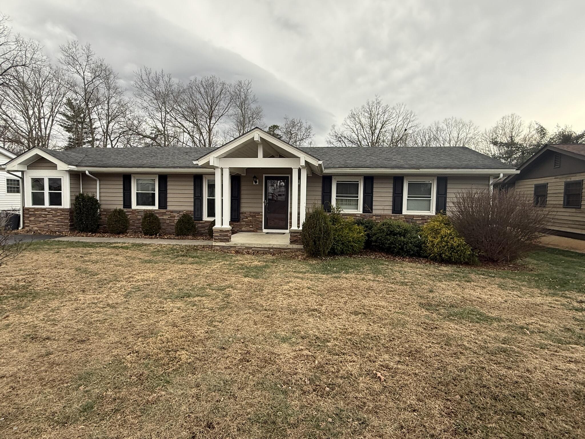 front view of a house with a yard