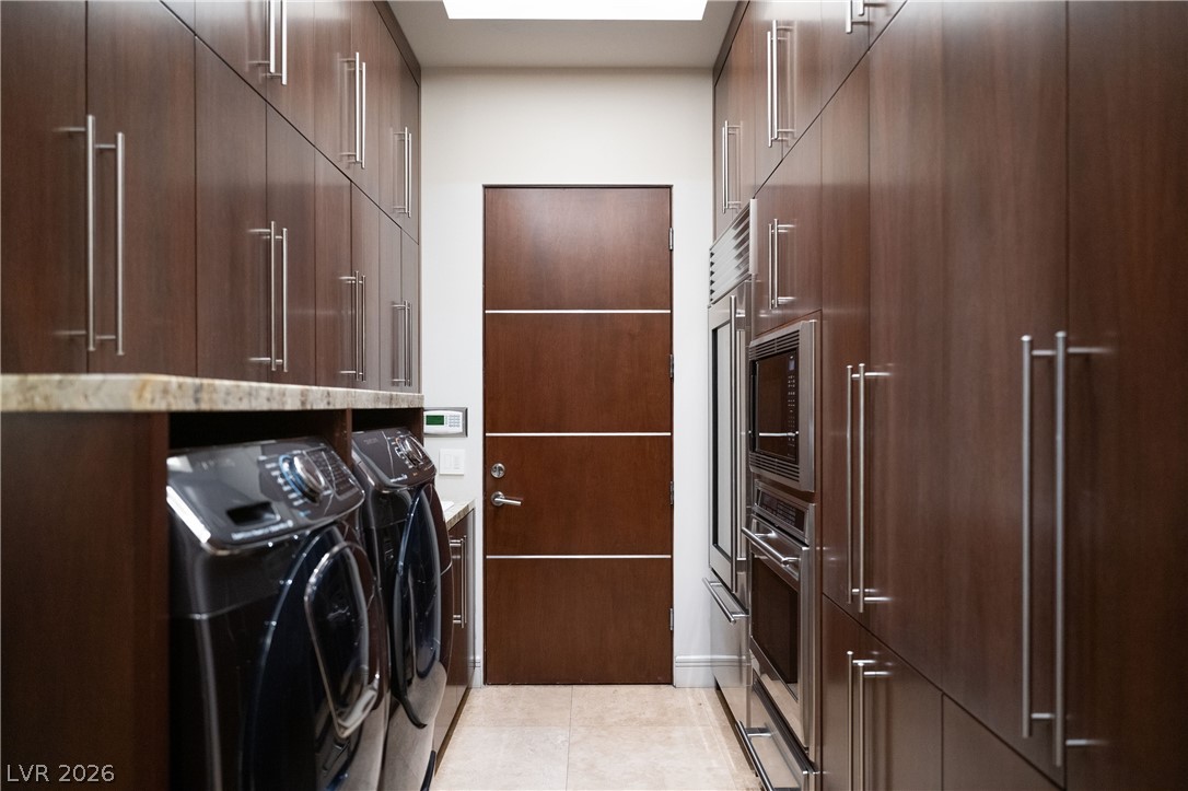91 Hawk Ridge Drive Las Vegas, NV 89135 - Photo 65 of 97 Butler Pantry and Downstairs Laundry