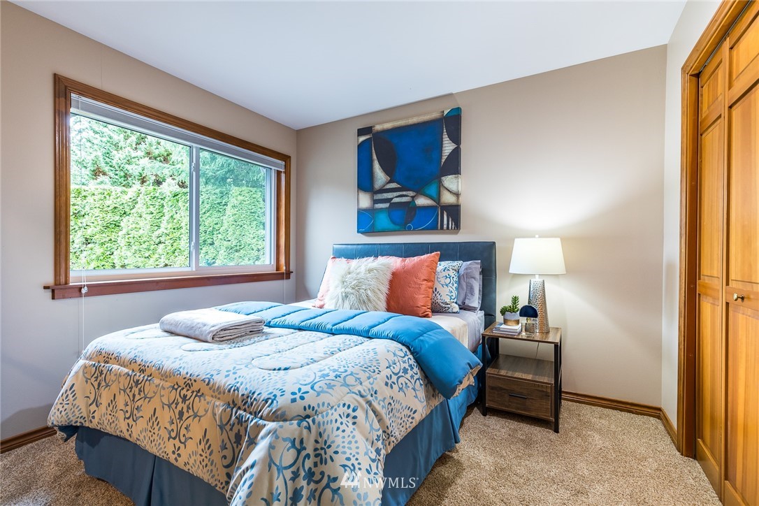 2707 187th Street Southeast Bothell, WA 98012 - Photo 23 of 39 a bedroom with a bed and a window