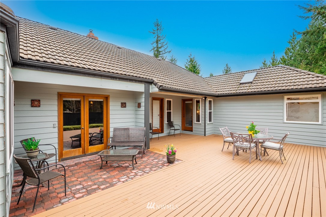 2707 187th Street Southeast Bothell, WA 98012 - Photo 29 of 39 a backyard of a house with seating space