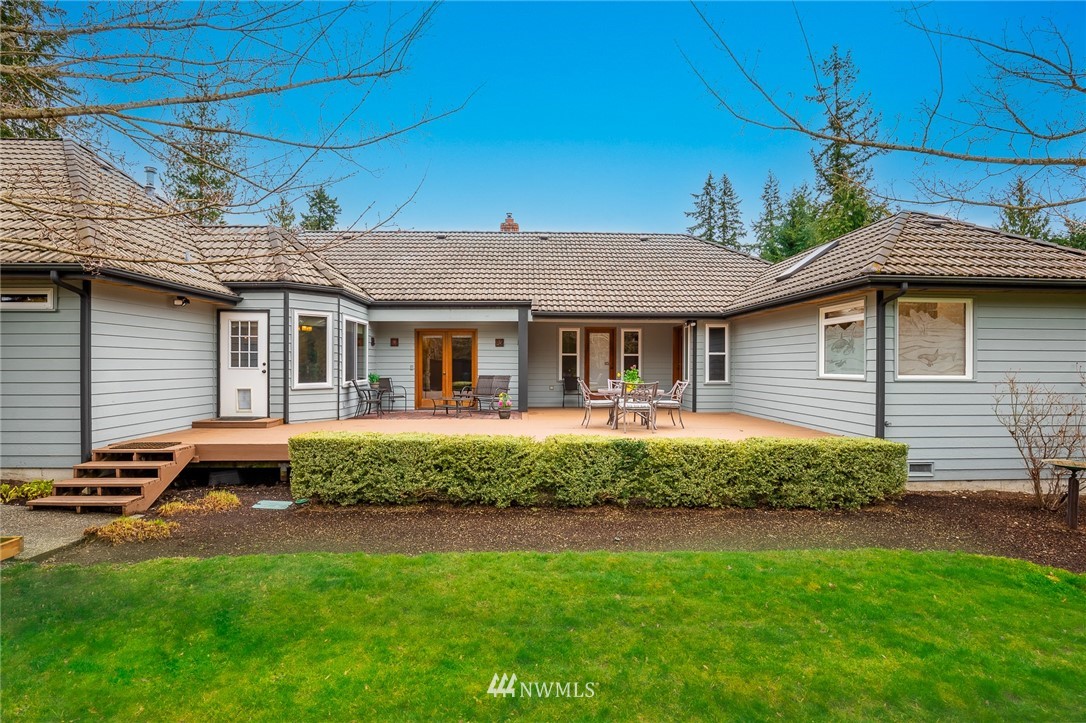 2707 187th Street Southeast Bothell, WA 98012 - Photo 33 of 39 a front view of a house with a garden