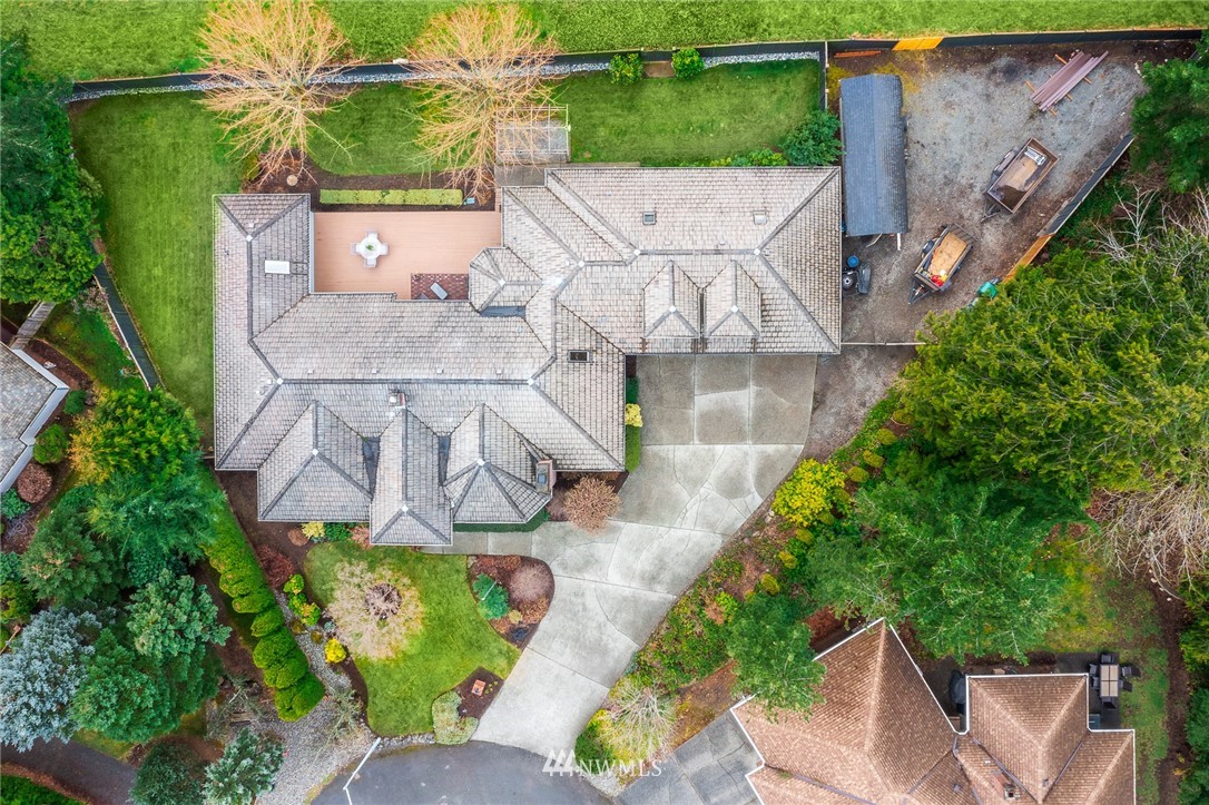 2707 187th Street Southeast Bothell, WA 98012 - Photo 34 of 39 an aerial view of a house with outdoor space garden and mountain view