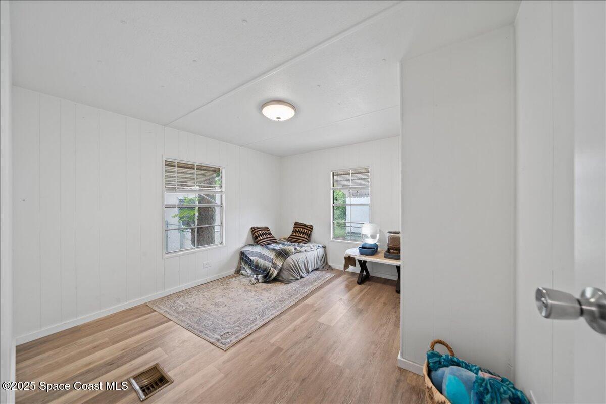 6983 Chestnut Drive Cocoa, FL 32927 - Photo 17 of 28 a living room with furniture and a window