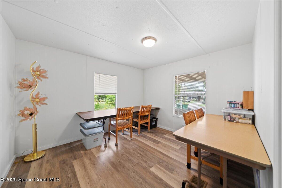 6983 Chestnut Drive Cocoa, FL 32927 - Photo 18 of 28 a view of a dining room with furniture window and outside view