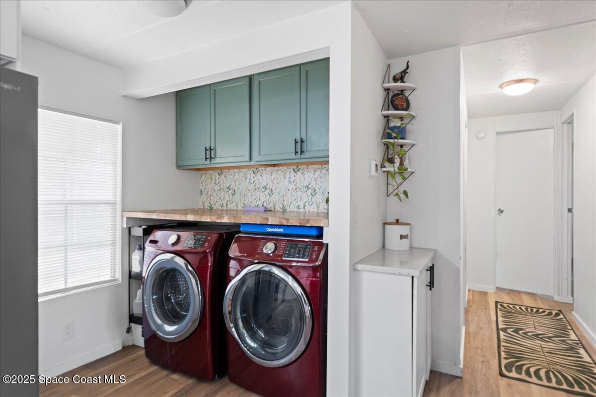 6983 Chestnut Drive Cocoa, FL 32927 - Photo 20 of 28 a utility room with dryer and washer