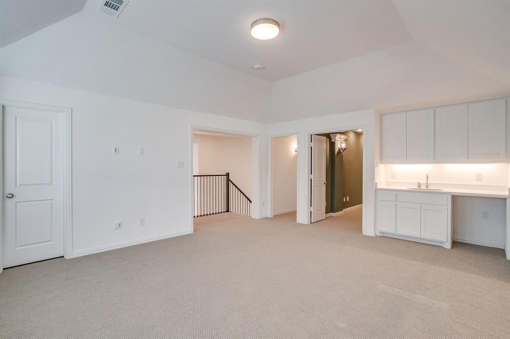 14328 Capridge Road Fort Worth, TX 76008 - Photo 27 of 40 a view of an empty room with closet and a window