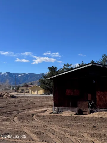 a view of balcony with two chairs